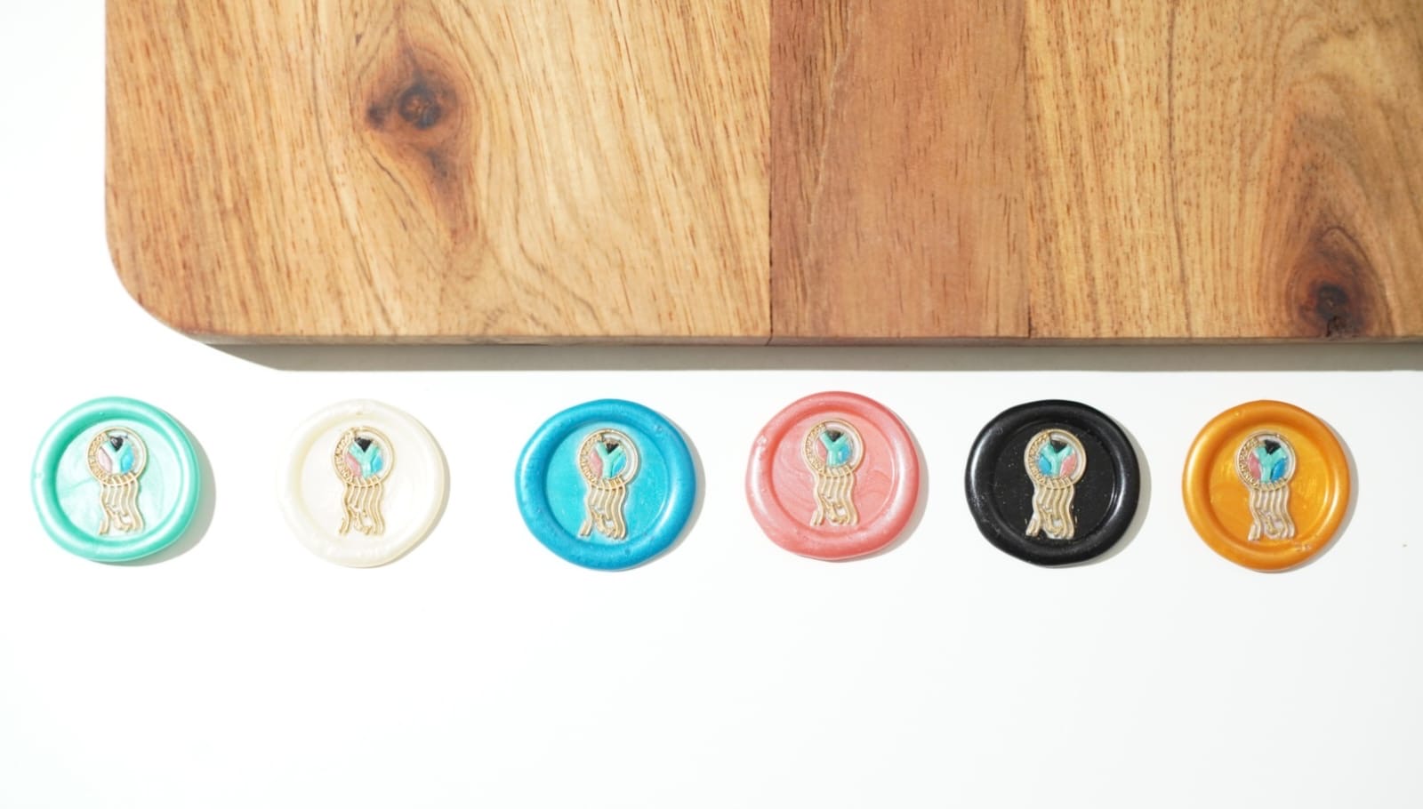 Microartistry in wax seals

Multicoloured wax